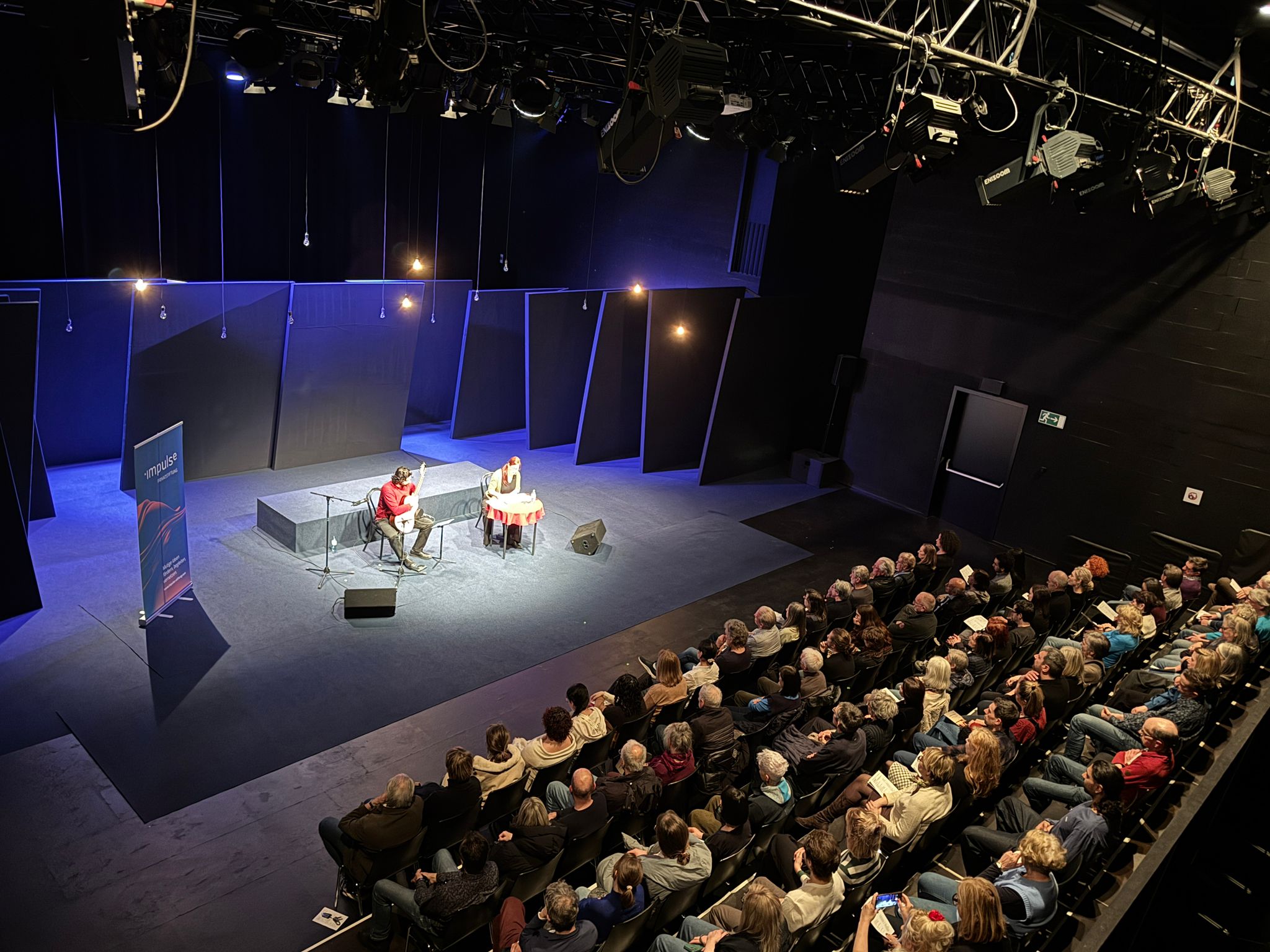 Audience and stage at Jenseits der Grenze, Theater Kosmos